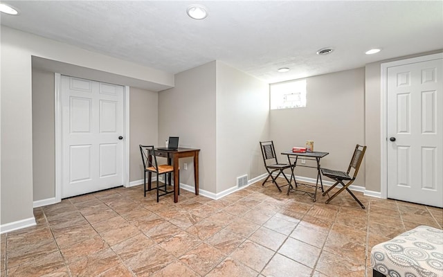 interior space with visible vents, recessed lighting, baseboards, and stone finish floor
