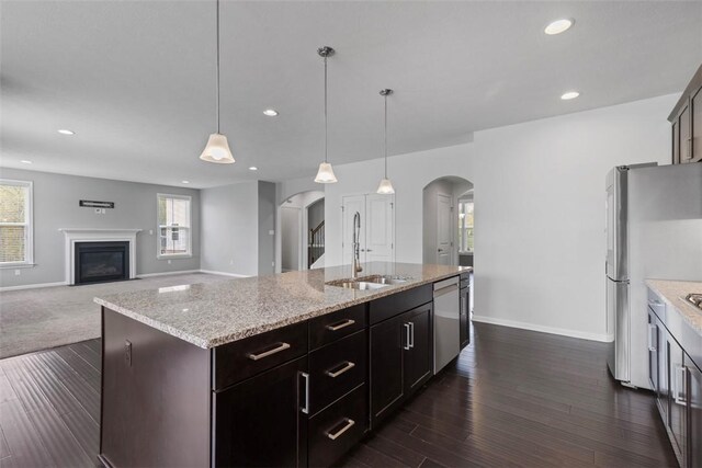 238 Gabriel Dr, Adams Twp, PA 16046 - kitchen featuring arched walkways, a sink, baseboards, appliances with stainless steel finishes, and recessed lighting