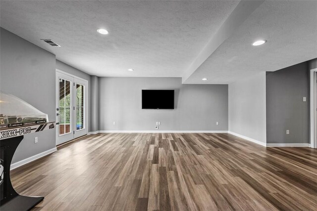 238 Gabriel Dr, Adams Twp, PA 16046 - unfurnished living room with a textured ceiling, wood finished floors, baseboards, and recessed lighting