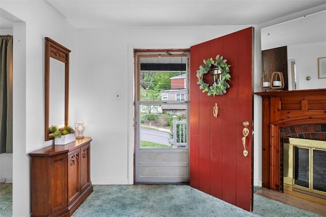 4044 Cloverlea St, Brentwood, PA 15227 - doorway with a brick fireplace, baseboards, and carpet