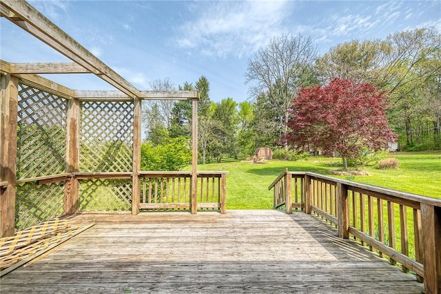 wooden terrace with a yard