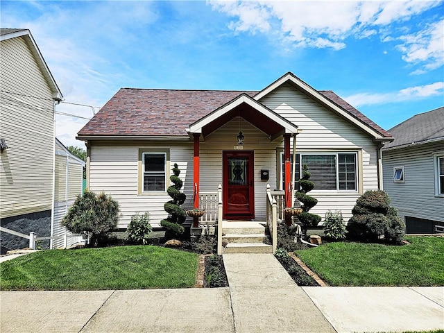 bungalow with a front yard