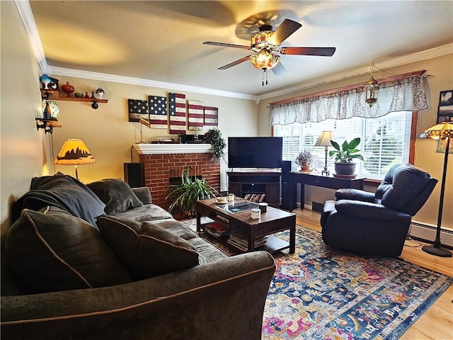 living room featuring a fireplace, a ceiling fan, wood finished floors, a baseboard radiator, and ornamental molding