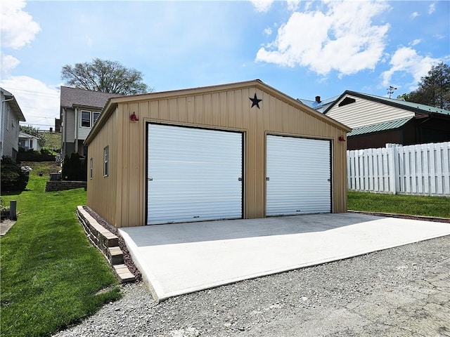 detached garage with fence