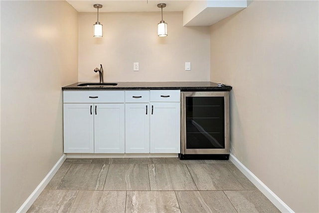 4917 Leona Dr, Baldwin Boro, PA 15227 - bar with baseboards, beverage cooler, decorative light fixtures, and a sink