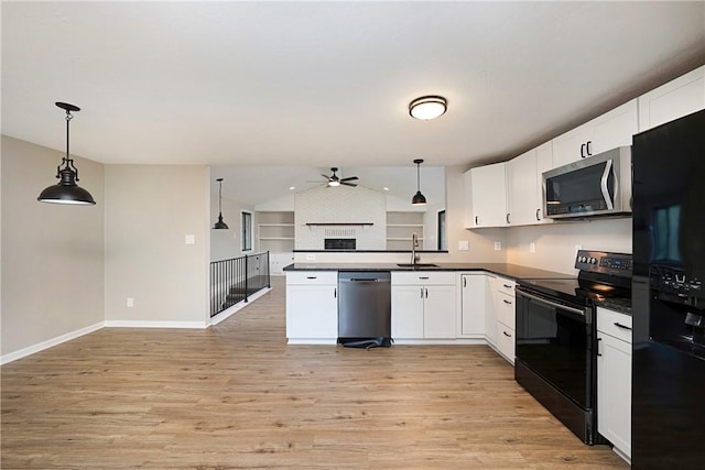 4917 Leona Dr, Baldwin Boro, PA 15227 - kitchen featuring a ceiling fan, dark countertops, open floor plan, a sink, and black appliances