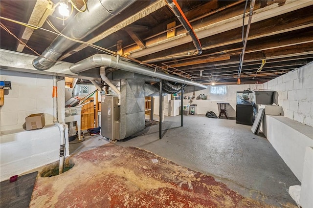 basement featuring heating unit