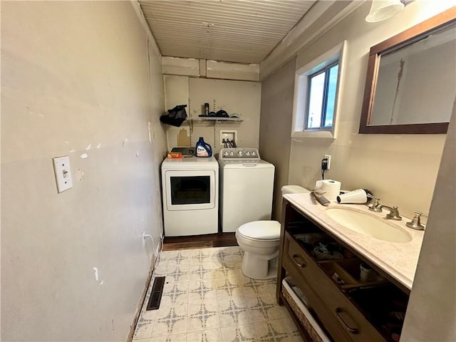 206 S State, St, PA 16222 - bathroom featuring visible vents, tile patterned floors, vanity, toilet, and washer and clothes dryer