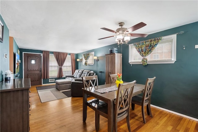 303 Ilex Dr, Ross Twp, PA 15237 - dining room with ceiling fan, light wood-style flooring, and baseboards