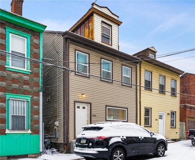 1013 Constance St, East Allegheny, PA 15212 - townhome / multi-family property featuring a chimney