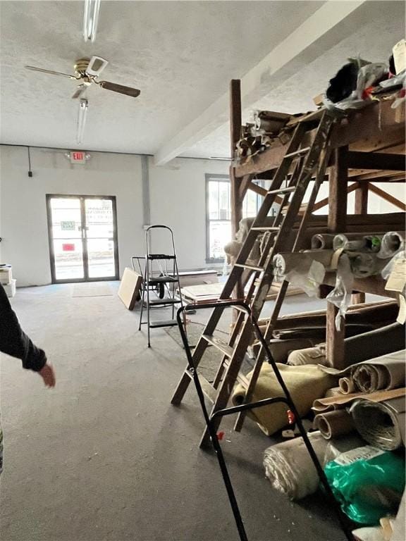 unfurnished bedroom featuring carpet floors and a textured ceiling