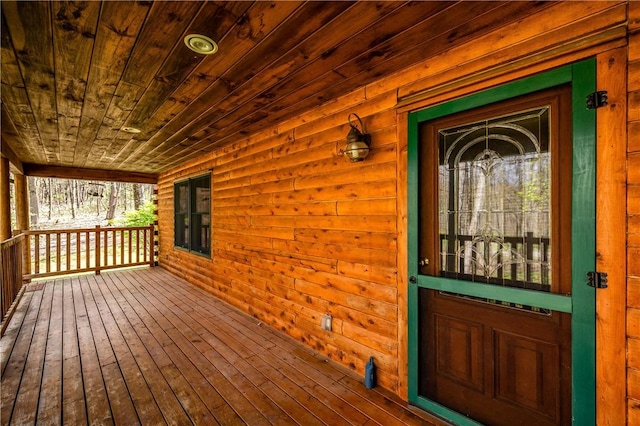 property entrance with covered porch