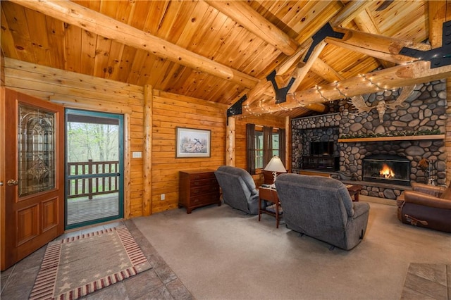 carpeted living area with wooden walls, wooden ceiling, lofted ceiling with beams, and a fireplace