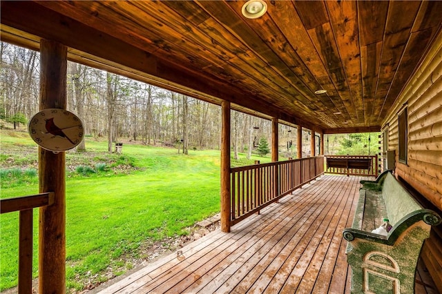 deck featuring a lawn