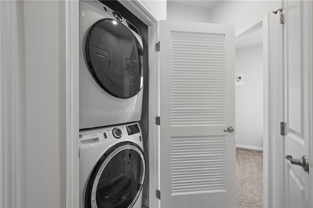 4404 Spruce Rd, Pine Twp Nal, PA 15044 - laundry room featuring carpet floors, laundry area, baseboards, and stacked washer / dryer