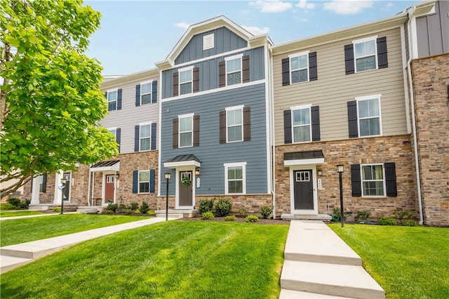 4404 Spruce Rd, Pine Twp Nal, PA 15044 - townhome / multi-family property with board and batten siding, stone siding, and a front yard