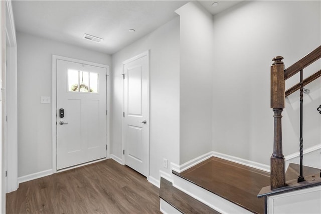 4404 Spruce Rd, Pine Twp Nal, PA 15044 - entryway featuring stairs, baseboards, visible vents, and wood finished floors