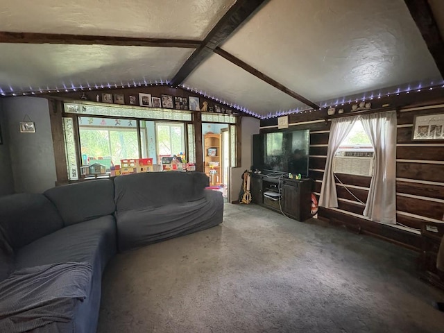 living room with vaulted ceiling with beams and carpet flooring