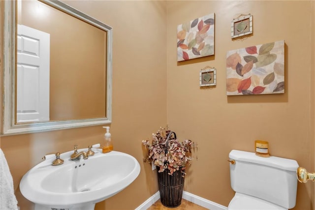 6181 Brown Rd, Penn Twp, PA 16002 - half bathroom featuring a sink and toilet