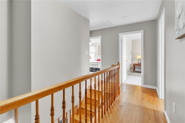 6181 Brown Rd, Penn Twp, PA 16002 - corridor featuring attic access, an upstairs landing, and light wood finished floors