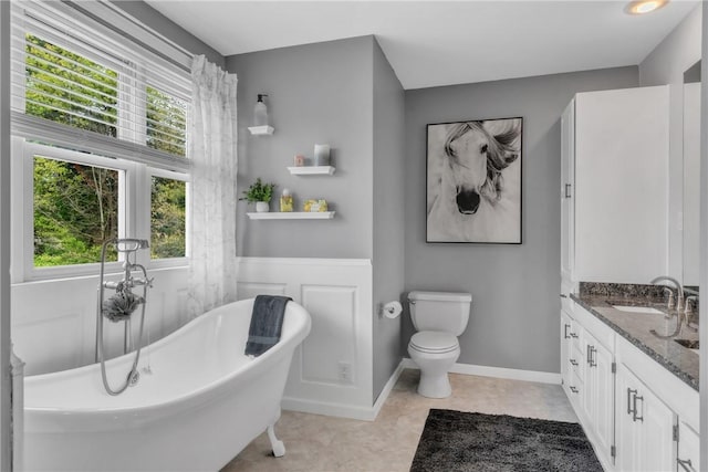 6181 Brown Rd, Penn Twp, PA 16002 - full bath with a freestanding bath, vanity, plenty of natural light, and tile patterned flooring