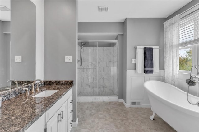 6181 Brown Rd, Penn Twp, PA 16002 - full bathroom featuring a shower stall, vanity, and a freestanding bath
