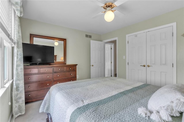 6181 Brown Rd, Penn Twp, PA 16002 - bedroom featuring light carpet, a closet, and a ceiling fan