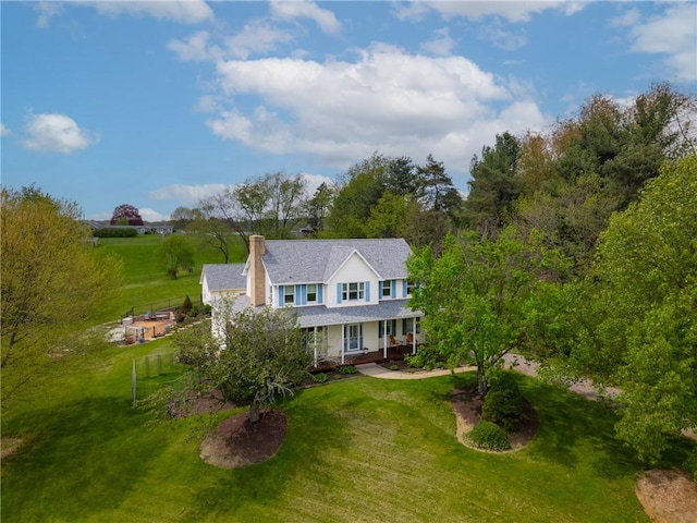 6181 Brown Rd, Penn Twp, PA 16002 - view of front of property with a chimney, a front yard, and a porch