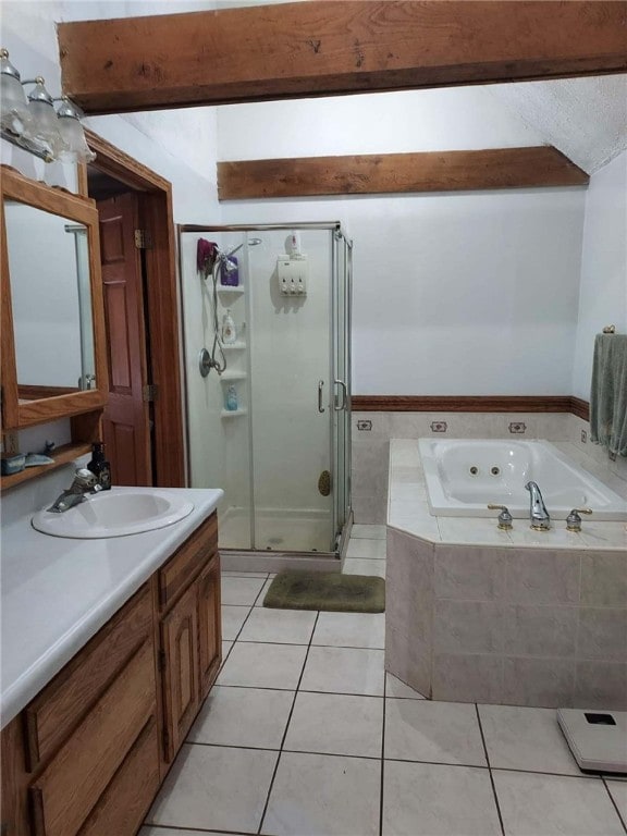 bathroom with vanity, a whirlpool tub, tile patterned flooring, and a stall shower