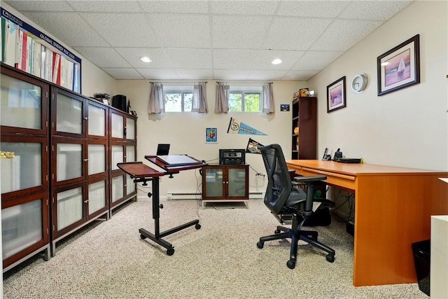 carpeted office with recessed lighting, a drop ceiling, and baseboard heating