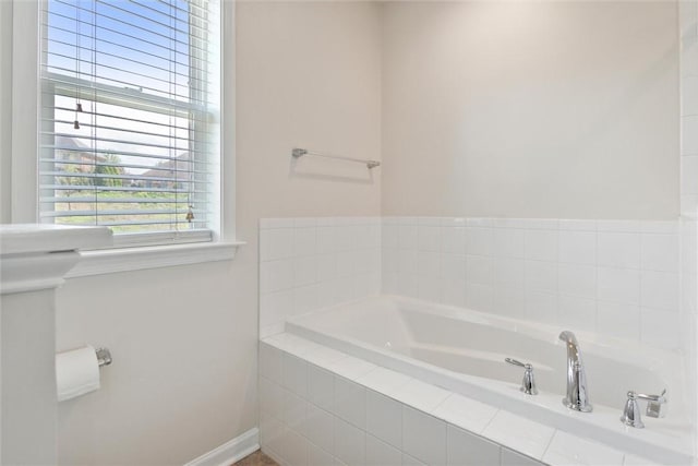 full bath featuring a bath
