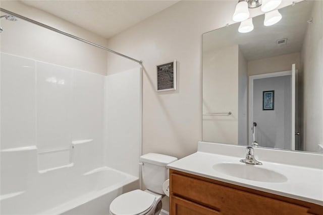 full bath featuring visible vents, bathing tub / shower combination, toilet, and vanity