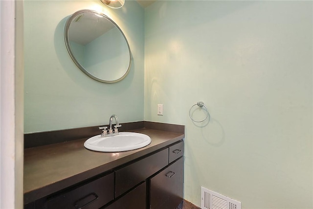 bathroom featuring visible vents and vanity
