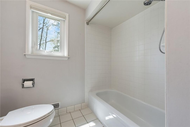 full bath featuring toilet, visible vents, shower / washtub combination, and tile patterned flooring