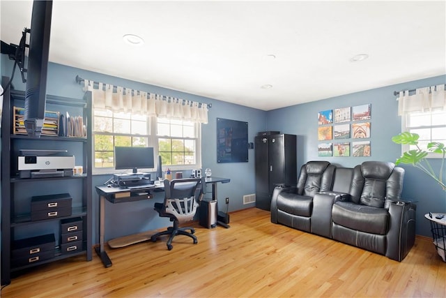 office with recessed lighting, visible vents, and wood finished floors
