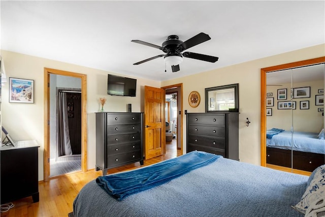 bedroom featuring a ceiling fan and light wood-style flooring