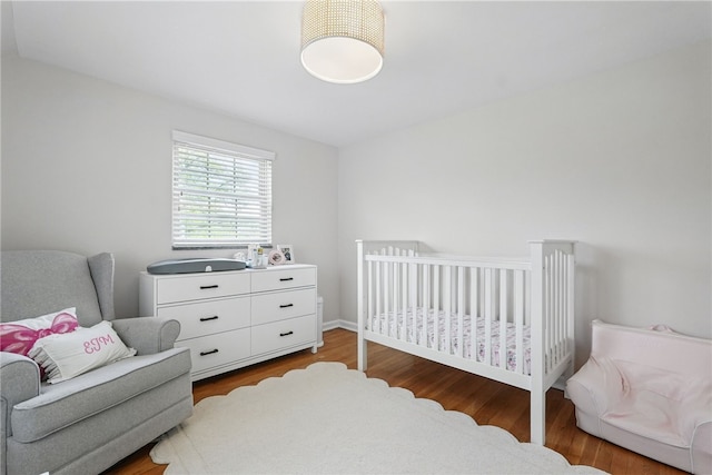 bedroom featuring wood finished floors