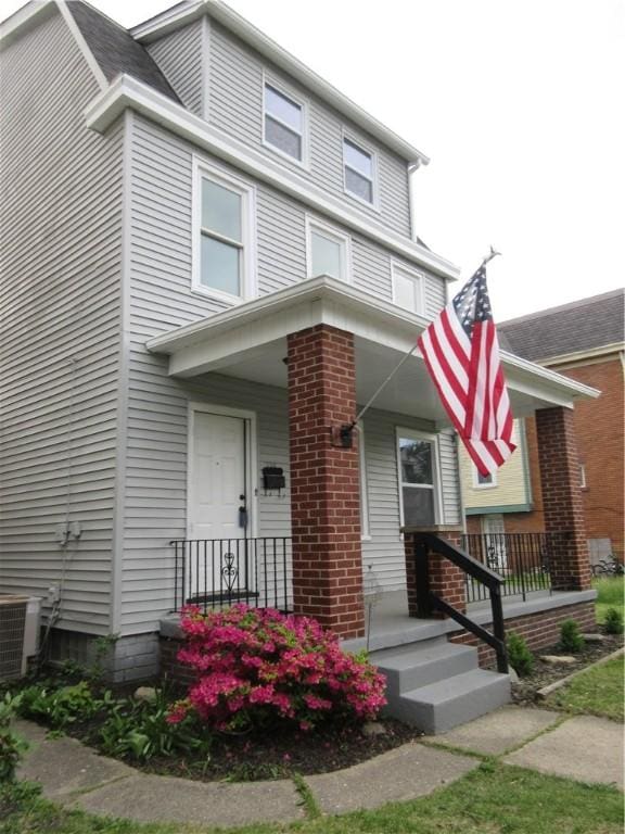 724 Maplewood Ave, Ambridge, PA 15003 - american foursquare style home with covered porch and central AC unit