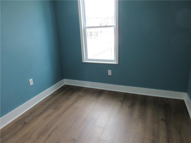724 Maplewood Ave, Ambridge, PA 15003 - empty room featuring wood finished floors and baseboards