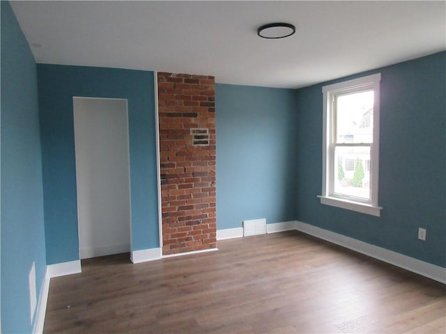 724 Maplewood Ave, Ambridge, PA 15003 - unfurnished room featuring wood finished floors and baseboards