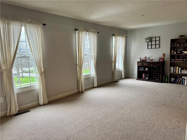 2001 Trillium Ct, North Strabane, PA 15317 - carpeted empty room with baseboards, visible vents, and a wealth of natural light