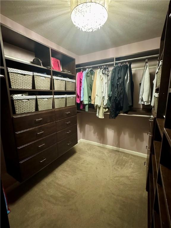2001 Trillium Ct, North Strabane, PA 15317 - spacious closet featuring carpet floors and a notable chandelier