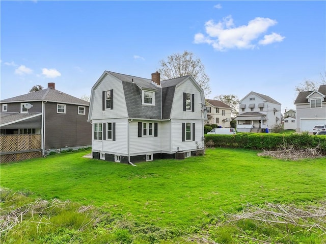 848 Ohio Ave, Monaca, PA 15061 - back of property featuring a residential view, a shingled roof, a gambrel roof, a chimney, and a yard