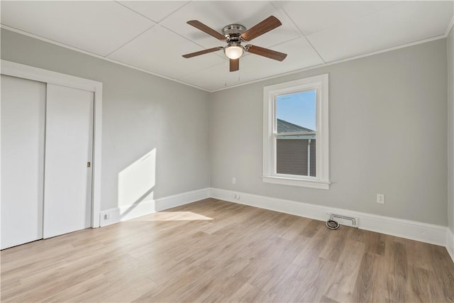 848 Ohio Ave, Monaca, PA 15061 - unfurnished bedroom with baseboards, visible vents, wood finished floors, and a closet