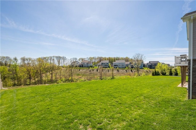 view of yard featuring a residential view