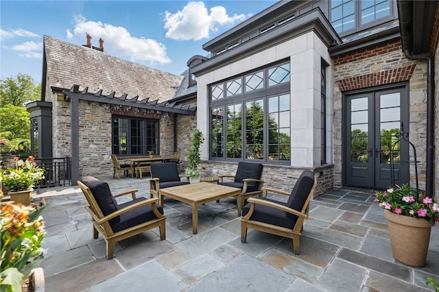 view of patio with a pergola and french doors