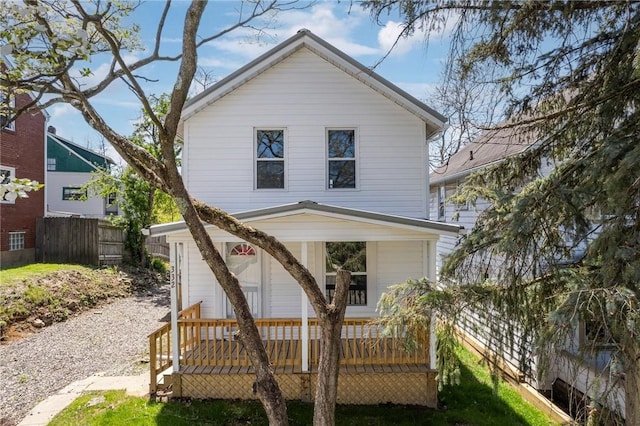 exterior space with fence and a wooden deck