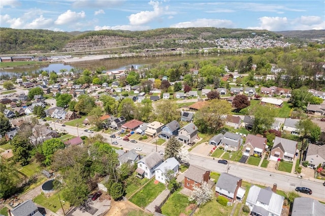 aerial view featuring a water view and a residential view