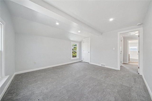 carpeted empty room with recessed lighting, baseboards, and visible vents
