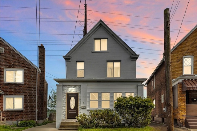 view of front of home with brick siding